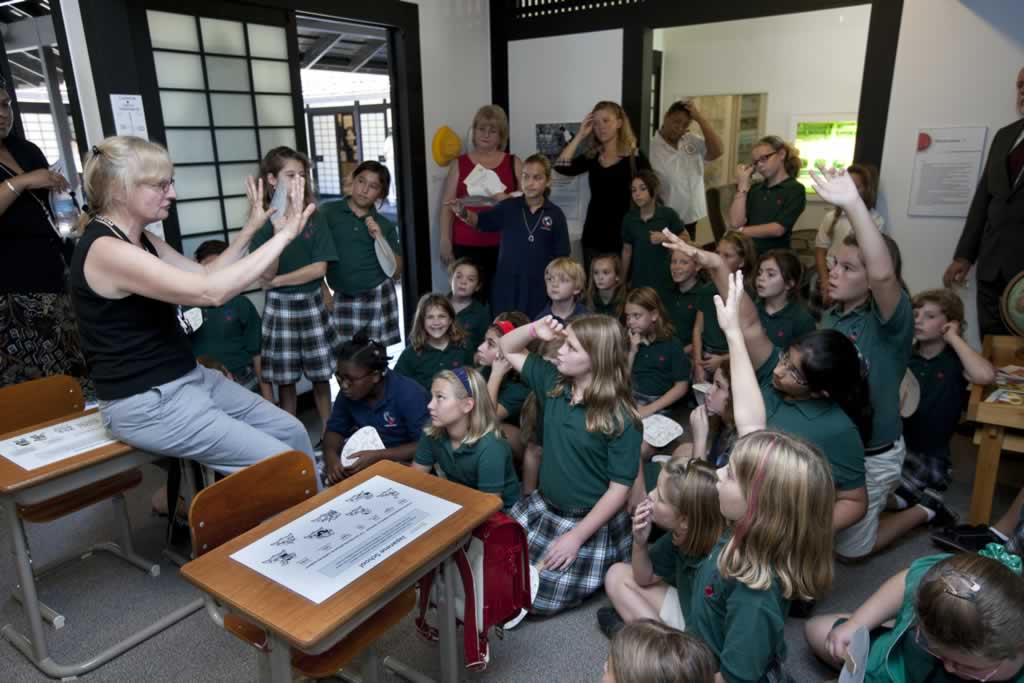 Explore the three writing systems, Japanese textbooks, and unique book-bags and uniforms on display in the Elementary School Classroom.
